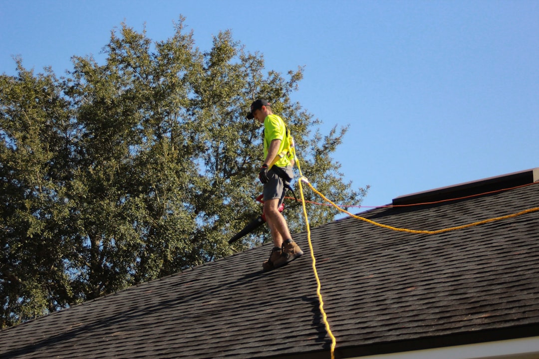 A professional roofing contractor at work